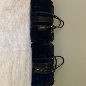 Steve Madden luggage and duffle bags.